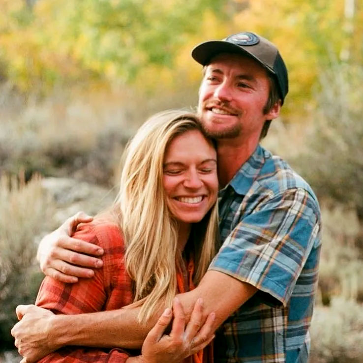 Young couple hugging.